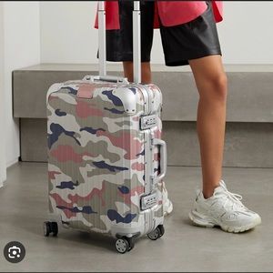 Brand new limited edition Rimowa suitcase carry-on.